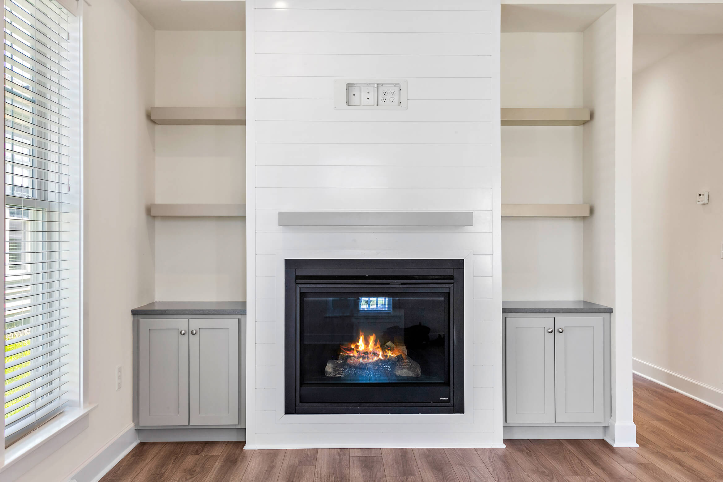Dogwood Cottage fireplace with built in bookcase