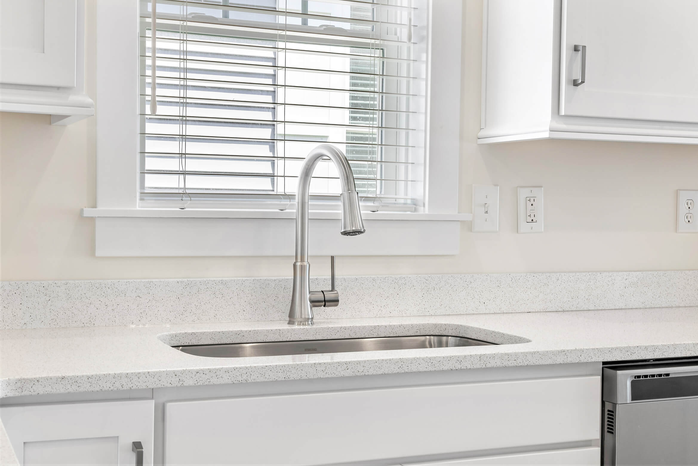 Stainless steel sink in kitchen