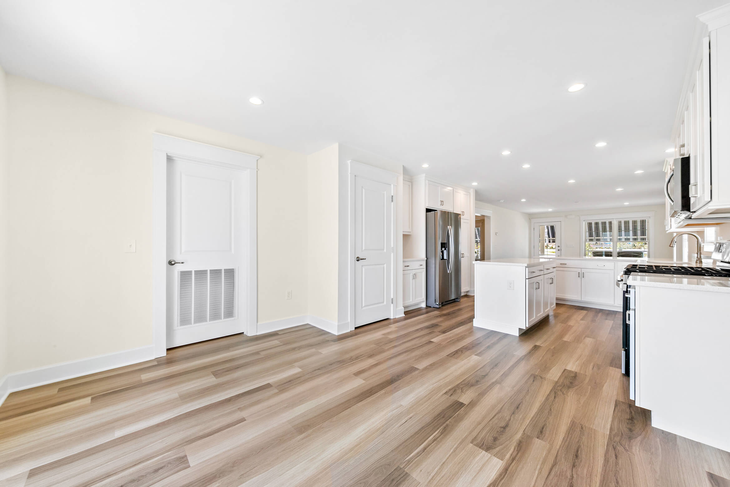 Spacious and bright kitchen with dining room