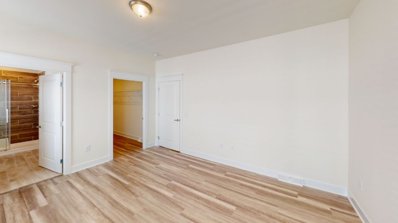 Bedroom with walk in closet