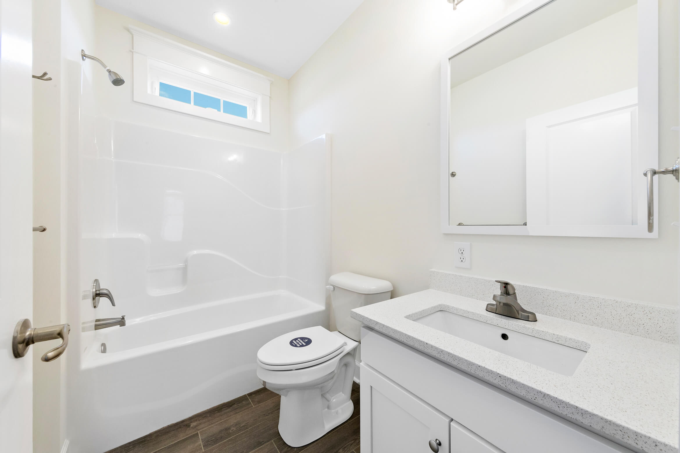 White bathroom with a tub