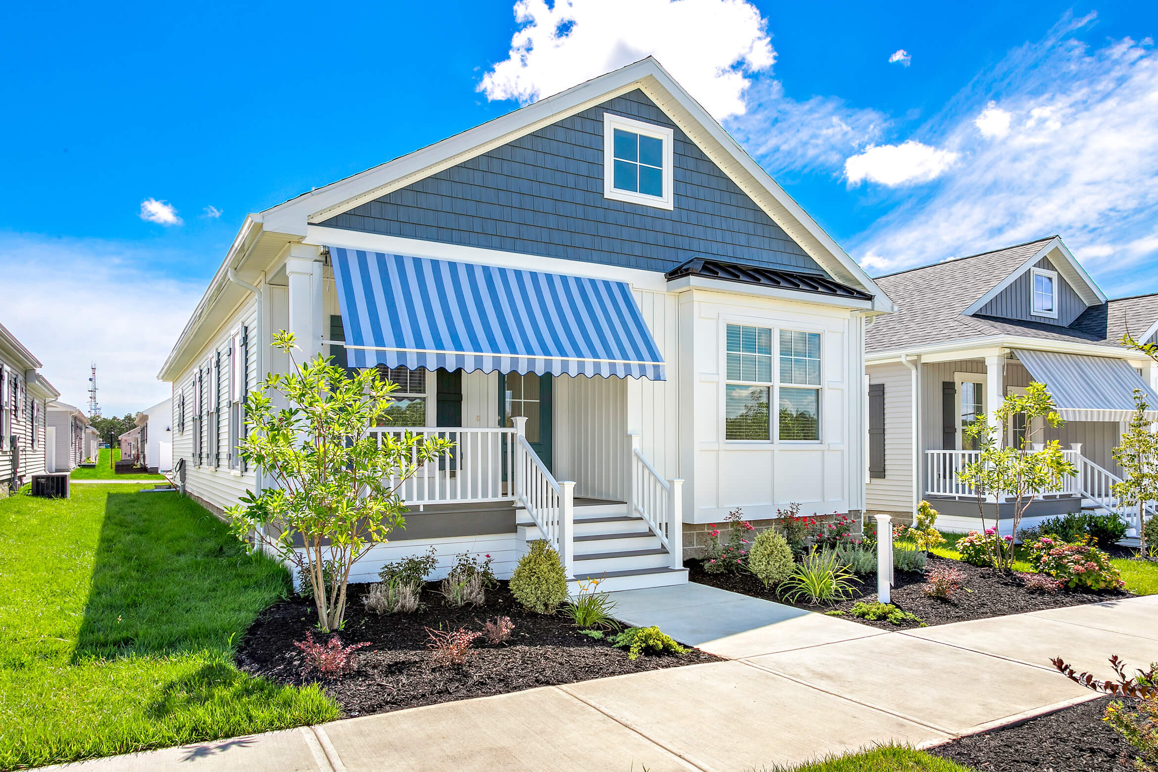 The awning over the Magnolia cottage porch at our 55+ community